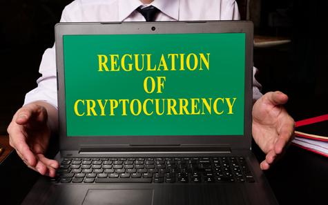 Regulation Of Cryptocurrency Law On The Laptop.